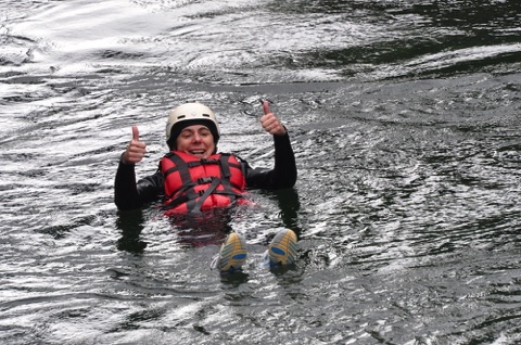 Thumbs up while floating